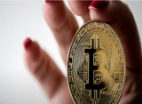 Record high bitcoin price approaches $63,000 mark