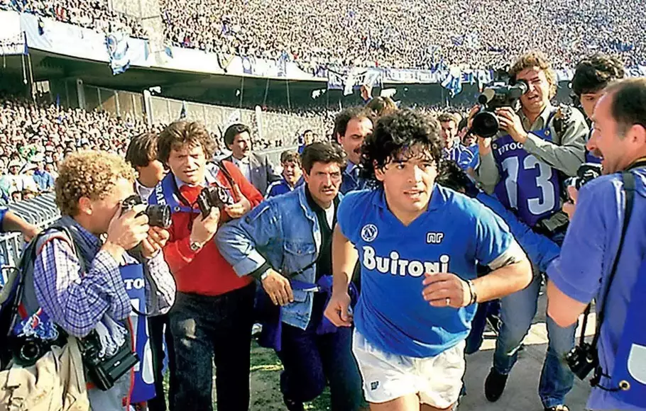 The late Maradona Celebrates Napoli's Success in Winning the /