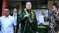 Elon Musk (center) speaks to the media during the launch of the Starlink satellite internet service at the Sumerta Kelod Community Health Center (Puskesmas) office, Denpasar City, Bali, on Sunday, May 19 2024. (AP Photo/Firdia Lisnawati)